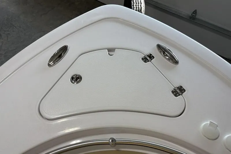 Slide: The Image of 2026 Sportsman Heritage 231 Center Console boat deck with storage compartment. - 6