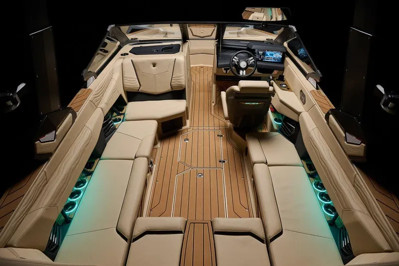 Slide: The Image of Manufacturer Provided Image: Luxurious interior of 2026 Nautique Super Air Nautique G23 with elegant seating and ambient lighting. - 18