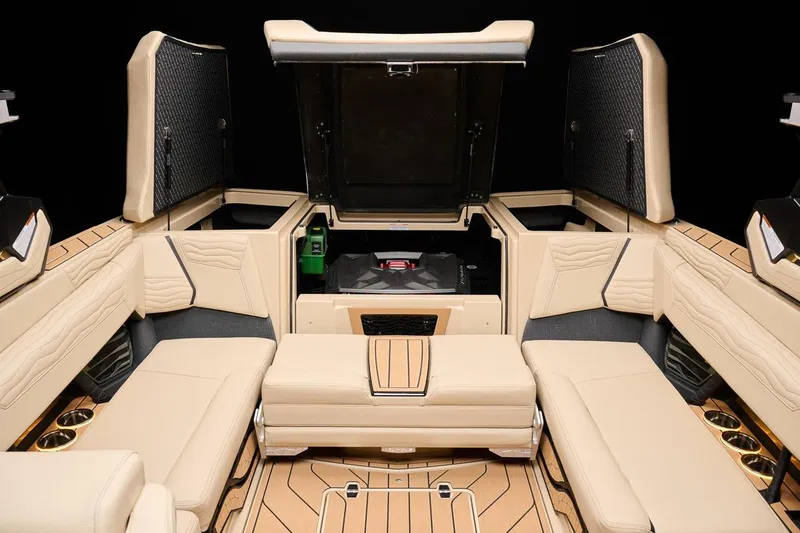 Slide: The Image of Manufacturer Provided Image: Luxurious interior of 2026 Nautique Super Air Nautique G23 boat with beige seating. - 21
