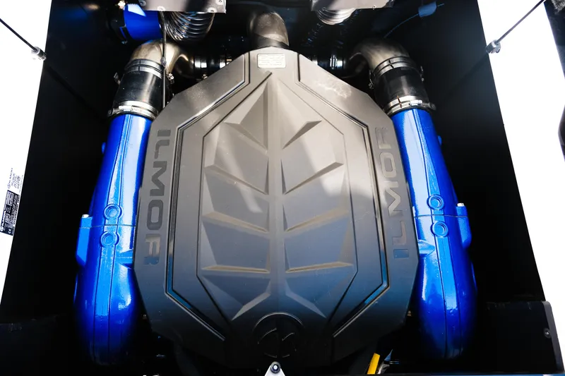 Slide: The Image of Engine of 2026 MasterCraft NXT23 boat with Ilmor branding and blue components. - 15