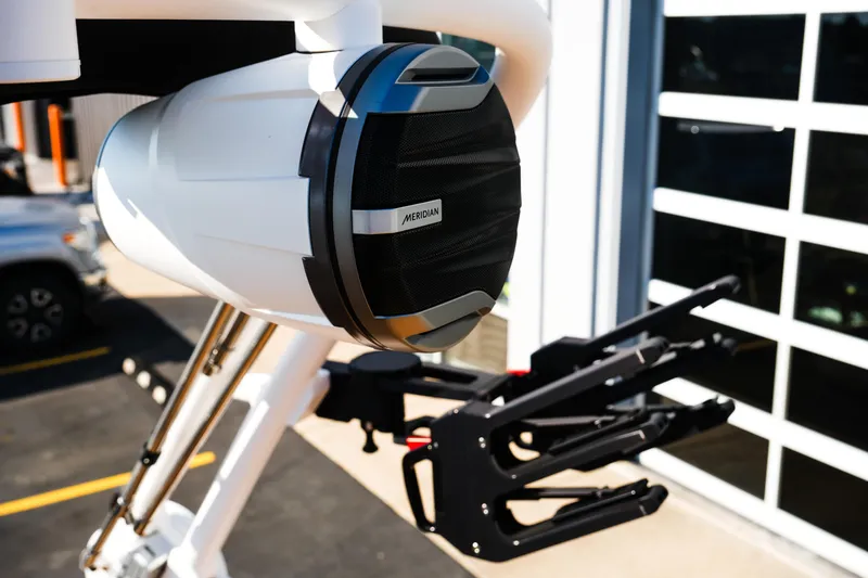 Slide: The Image of 2026 MasterCraft NXT23 boat speaker and wakeboard rack close-up. - 18