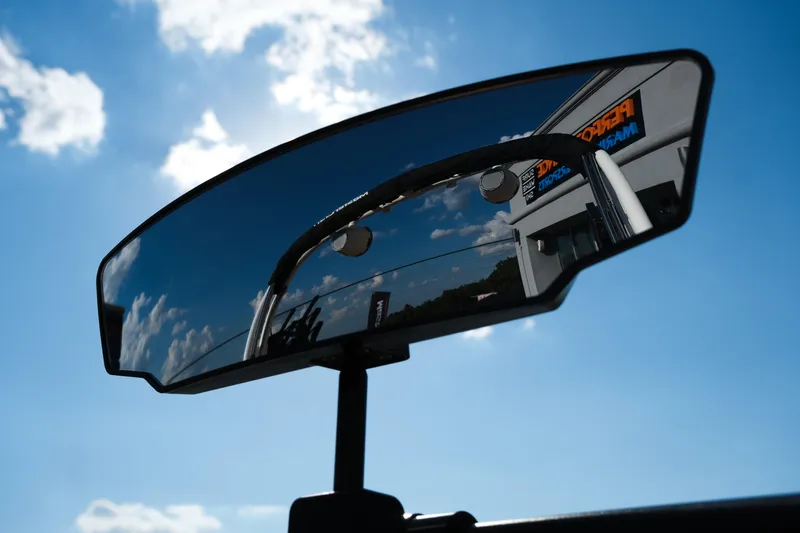 Slide: The Image of Rearview mirror reflecting sky on 2026 MasterCraft NXT23 boat. - 27