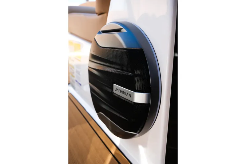 Slide: The Image of Close-up of a Meridian speaker on a 2026 MasterCraft NXT23 boat. - 34