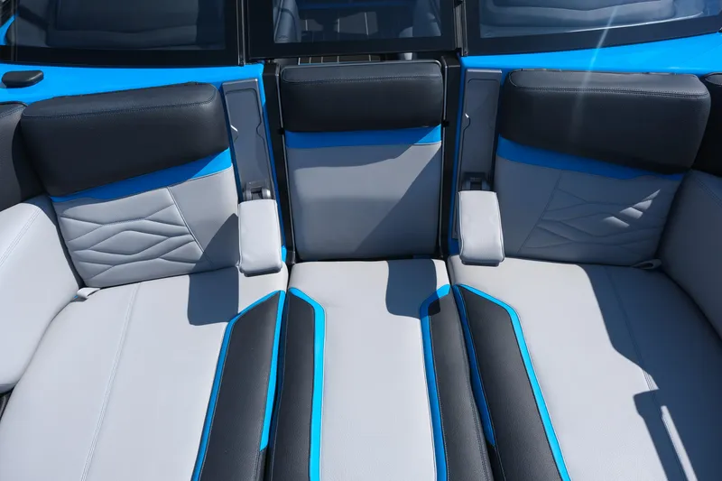Slide: The Image of 2026 Supra SA450 interior with blue and black leather seats, modern design. - 13