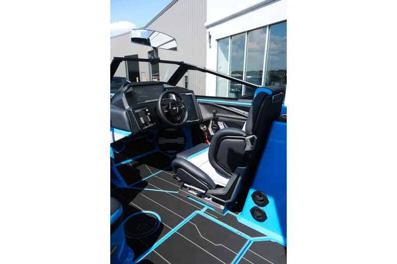 Slide: The Image of 2026 Supra SA450 boat interior with modern dashboard and steering wheel. - 17