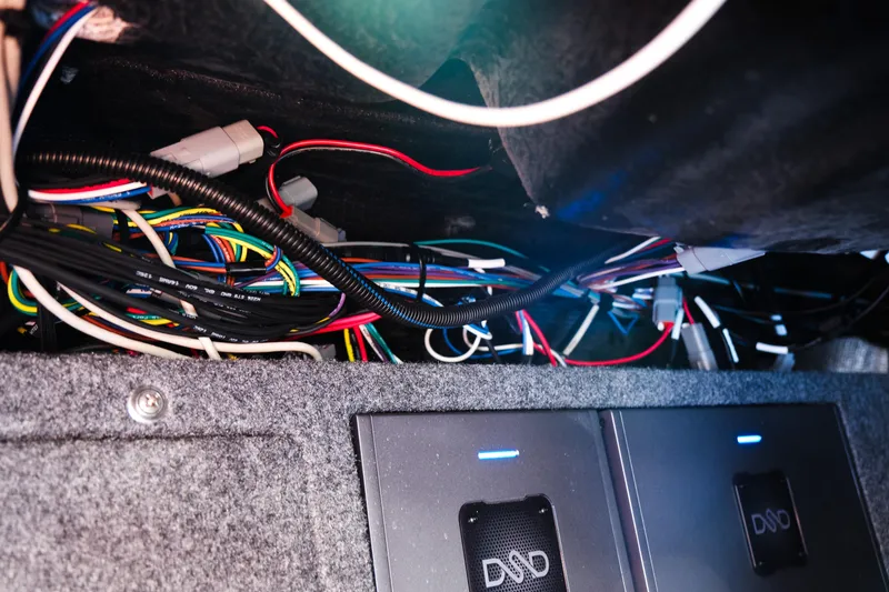 Slide: The Image of Interior wiring of a 2026 Supra SA450, showcasing complex cable arrangement and electronic components. - 18