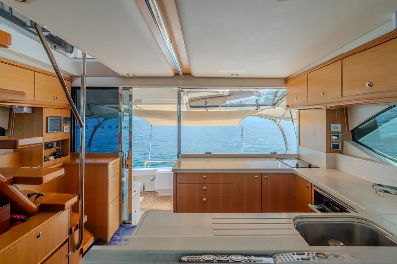 Slide: The Image of Riviera 52 Enclosed Flybridge 2016 - 11