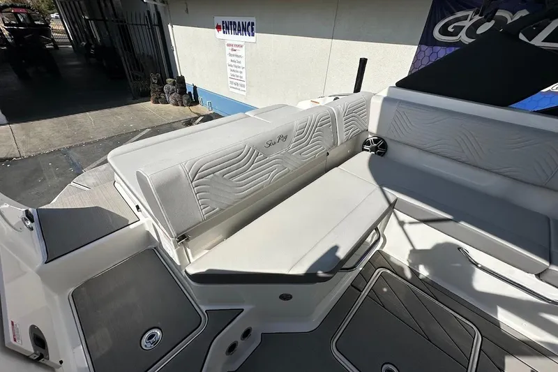 Slide: The Image of 2026 Sea Ray SDX 230 Surf boat interior with stylish seating and modern design. - 17
