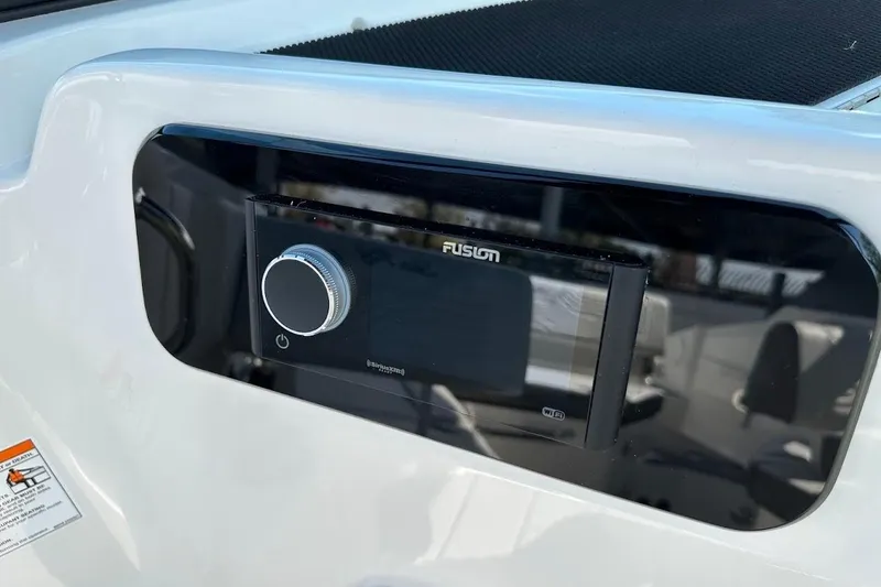 Slide: The Image of Fusion stereo system on 2026 Sea Ray SDX 230 Surf boat dashboard. - 35