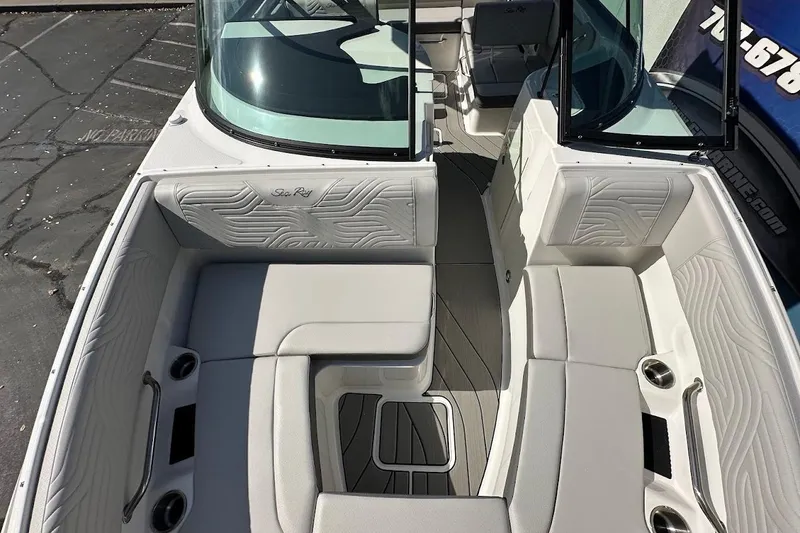 Slide: The Image of 2026 Sea Ray SDX 230 Surf boat interior with spacious seating and modern design. - 41
