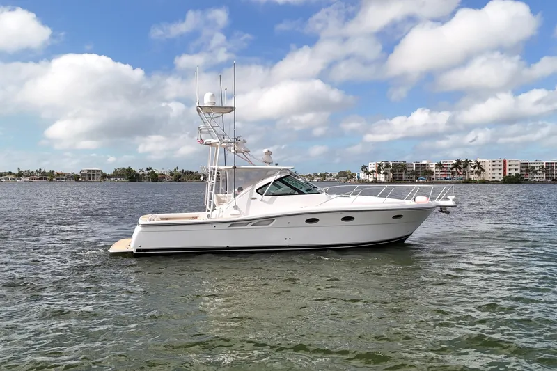 Slide: The Image of 2007 Tiara Yachts 3600 Open on calm water under a partly cloudy sky. - 10