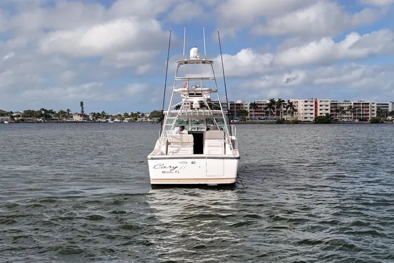 Slide: The Image of 2007 Tiara Yachts 3600 Open on water, Miami skyline in background. - 14