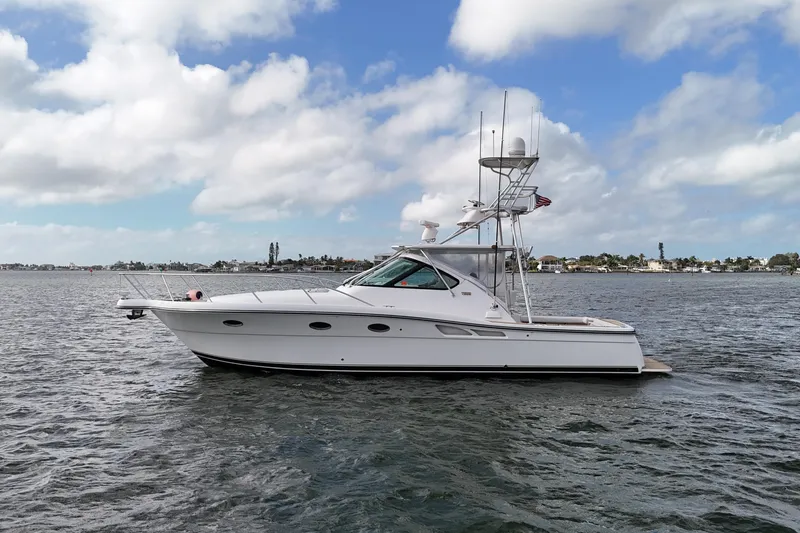 Slide: The Image of 2007 Tiara Yachts 3600 Open cruising on a calm sea under a partly cloudy sky. - 19