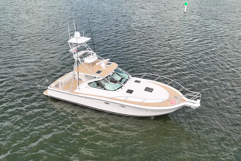 Slide: The Image of 2007 Tiara Yachts 3600 Open on water, aerial view. - 20