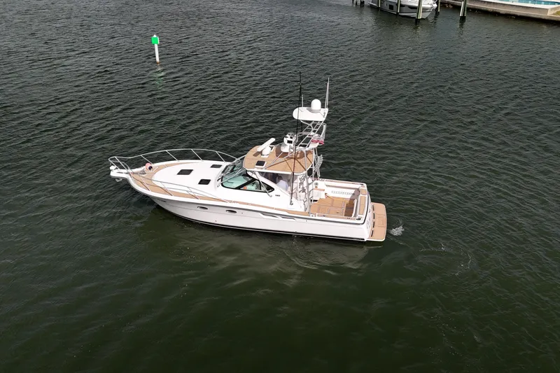 Slide: The Image of 2007 Tiara Yachts 3600 Open cruising on calm waters. - 24