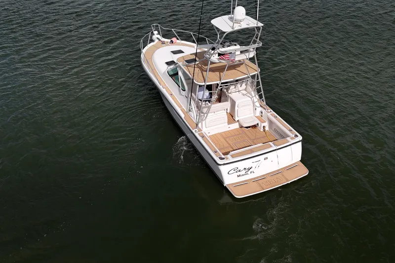 Slide: The Image of 2007 Tiara Yachts 3600 Open cruising on water, aerial view. - 25