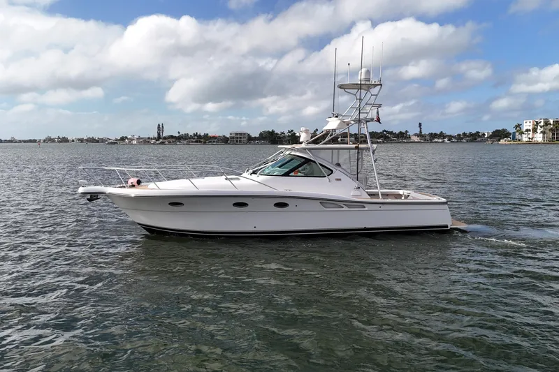 Slide: The Image of 2007 Tiara Yachts 3600 Open cruising on a calm, scenic waterway. - 3