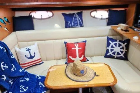 Slide: The Image of Nautical-themed interior of 2007 Tiara Yachts 3600 Open with anchor pillows and decor. - 45