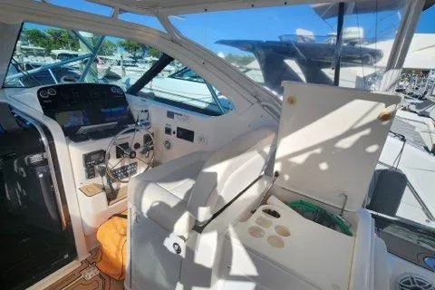 Slide: The Image of 2007 Tiara Yachts 3600 Open cockpit with steering wheel and control panel. - 46