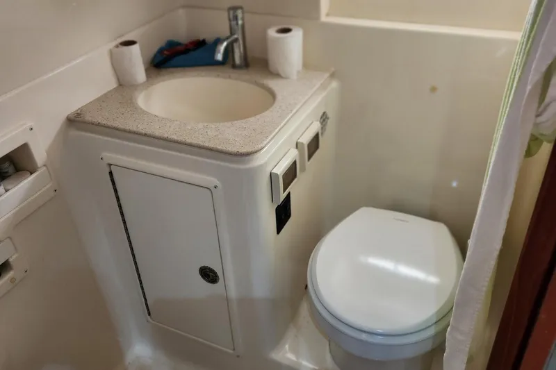 Slide: The Image of 2007 Tiara Yachts 3600 Open bathroom with sink and toilet. - 51