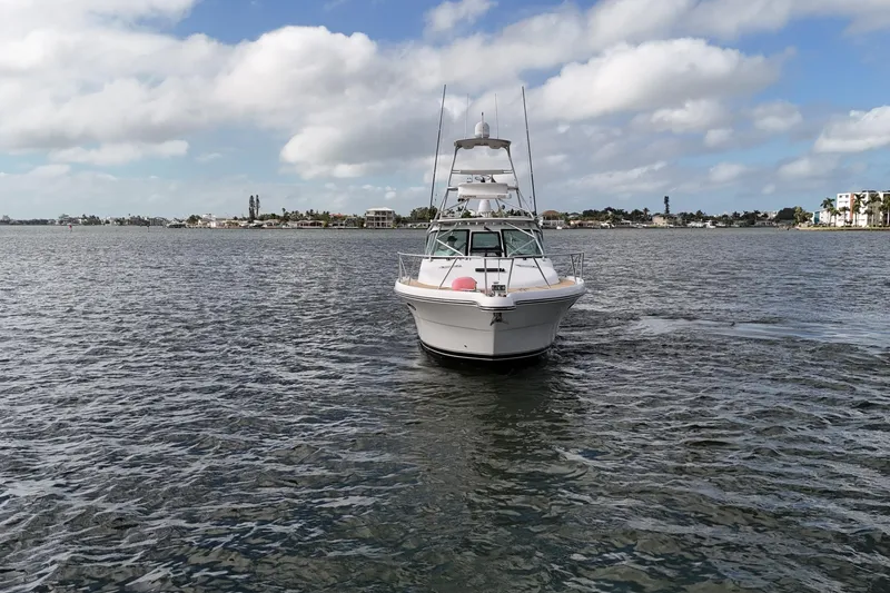 Slide: The Image of 2007 Tiara Yachts 3600 Open cruising on a calm, scenic waterway. - 6