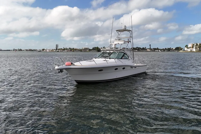 Slide: The Image of 2007 Tiara Yachts 3600 Open cruising on a calm, scenic waterway. - 8