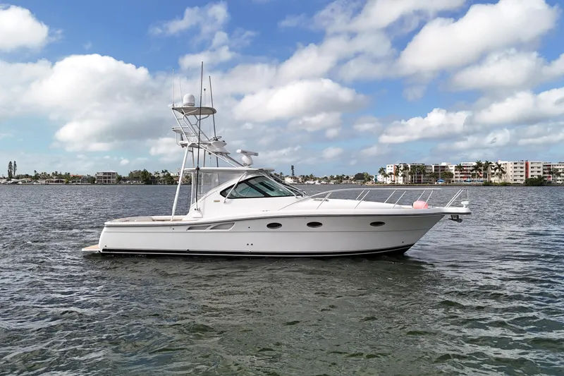 Slide: The Image of 2007 Tiara Yachts 3600 Open cruising on a calm, scenic waterway. - 9