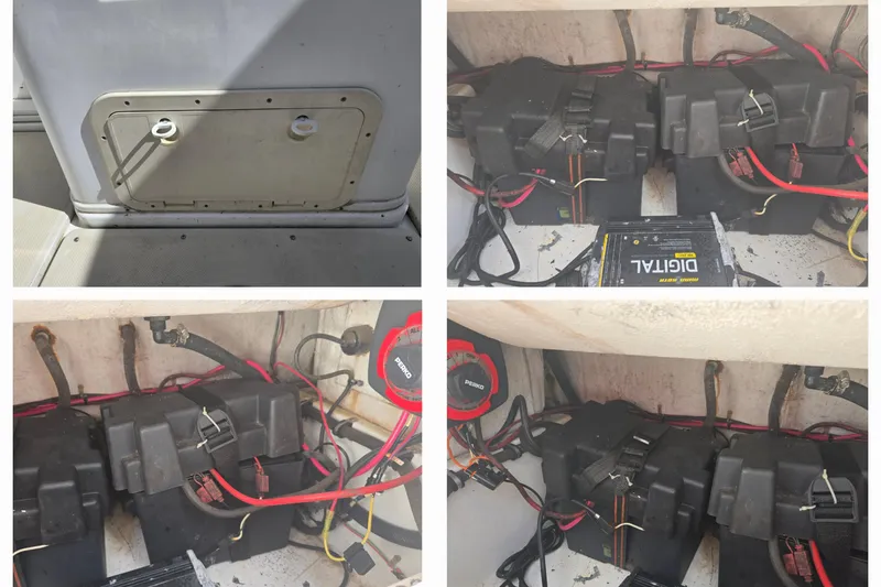 Slide: The Image of 1993 Robalo 2440 boat battery compartment with wiring and digital charger. - 15