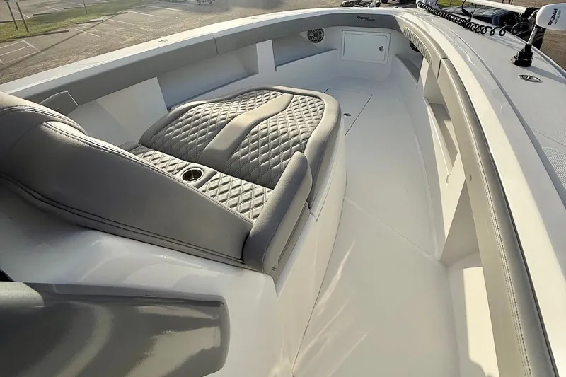 Slide: The Image of 2024 Front Runner 39 Center Console boat interior with luxurious seating and modern design. - 12