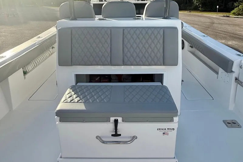 Slide: The Image of 2024 Front Runner 39 Center Console boat with cushioned seating and storage. - 15