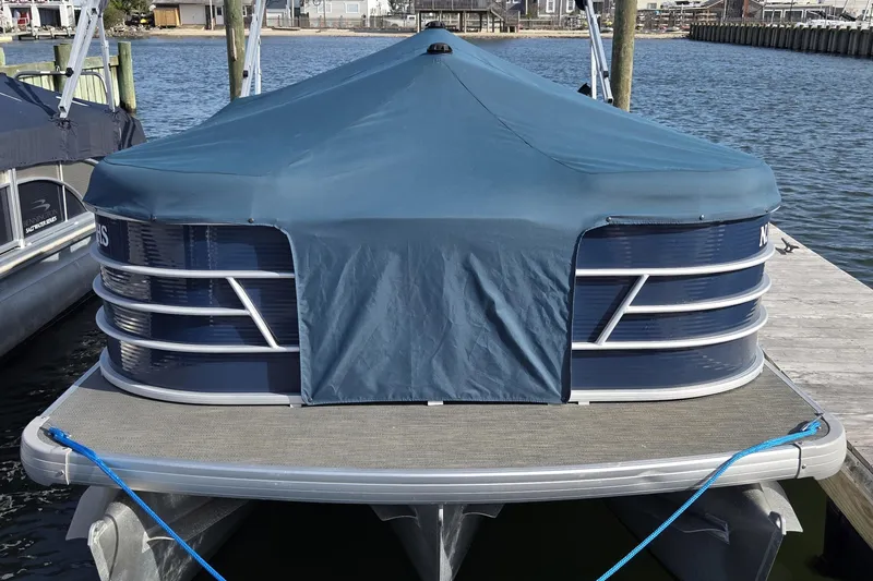 Slide: The Image of 2023 Godfrey Sweetwater 2286 SBX boat seating with cup holders and modern design. - 11