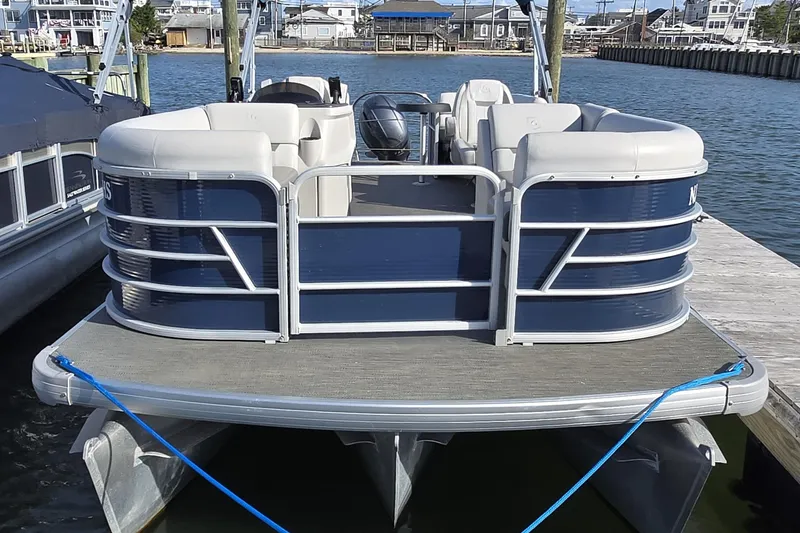 Slide: The Image of 2023 Godfrey Sweetwater 2286 SBX boat with Yamaha outboard motor at dock. - 13