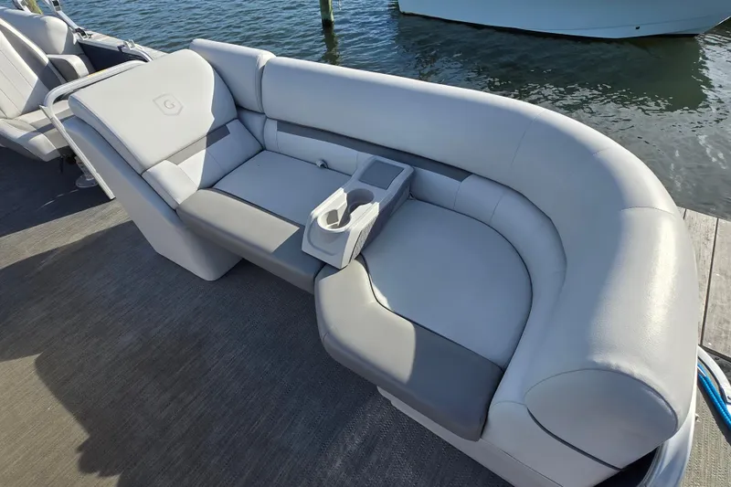 Slide: The Image of 2023 Godfrey Sweetwater 2286 SBX pontoon boat docked with cover. - 5