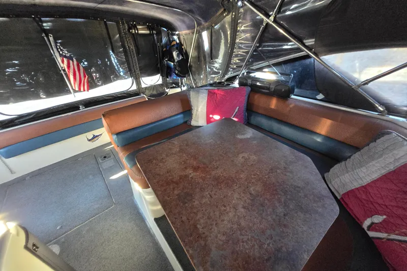 Slide: The Image of 1988 Bayliner 3450 Avanti bathroom with sink, toilet, and toiletries. - 25