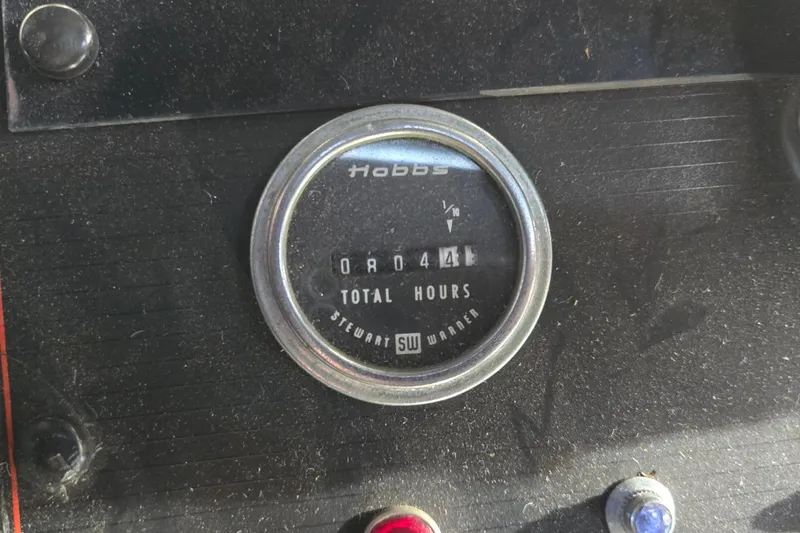 Slide: The Image of Interior of 1988 Bayliner 3450 Avanti with cozy seating and table setup. - 33