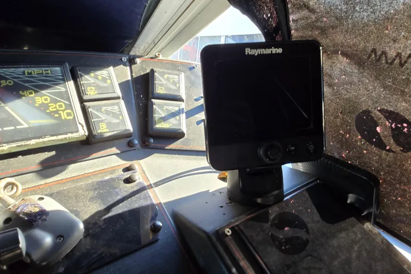 Slide: The Image of Garmin Fishfinder 160C on 1988 Bayliner 3450 Avanti dashboard. - 39