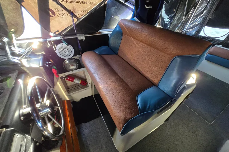 Slide: The Image of Dashboard of a 1988 Bayliner 3450 Avanti with Raymarine navigation system. - 41