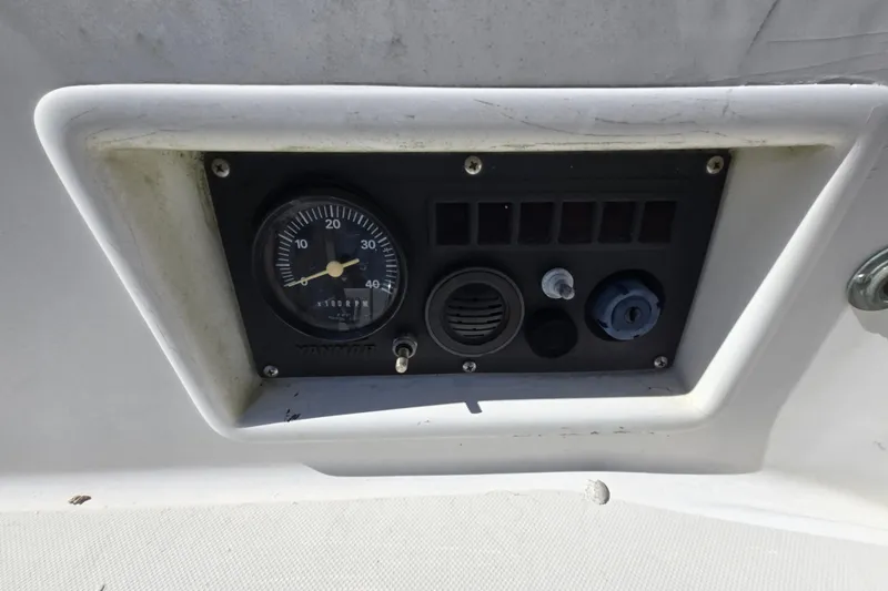 Slide: The Image of Control panel of a 1986 Pearson 303 Sloop sailboat with gauge and switches. - 30
