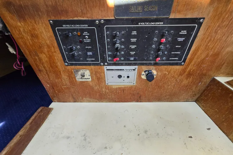 Slide: The Image of Electrical control panel on a 1986 Pearson 303 Sloop sailboat interior. - 21