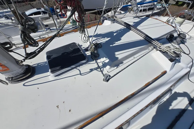 Slide: The Image of Deck of 1986 Pearson 303 Sloop with rigging and hatch details. - 9