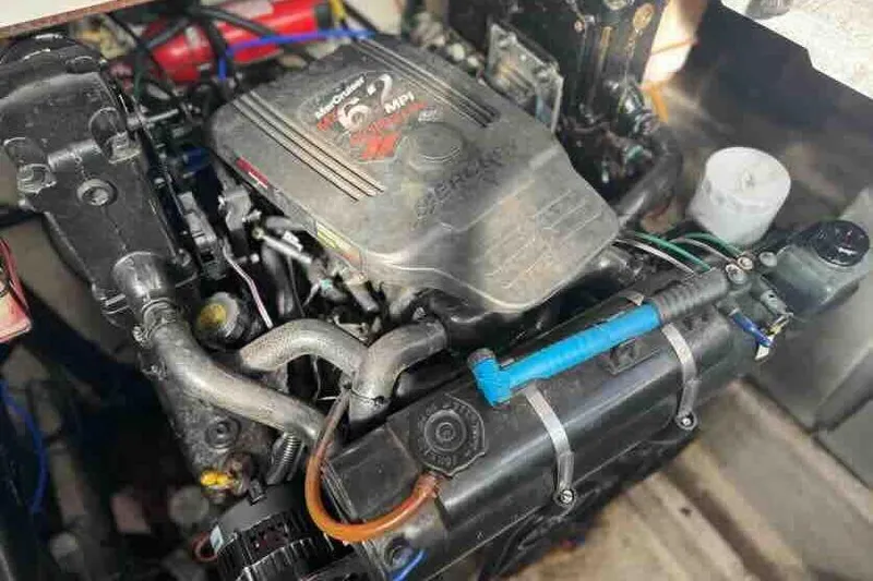 Slide: The Image of Engine of a 2005 Sea Ray 290 Amberjack boat, showcasing mechanical components. - 27