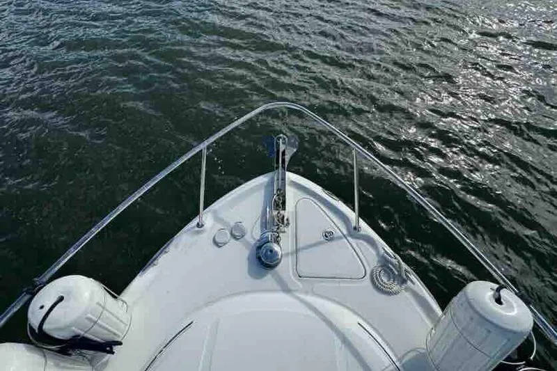 Slide: The Image of Bow view of 2005 Sea Ray 290 Amberjack on water. - 5