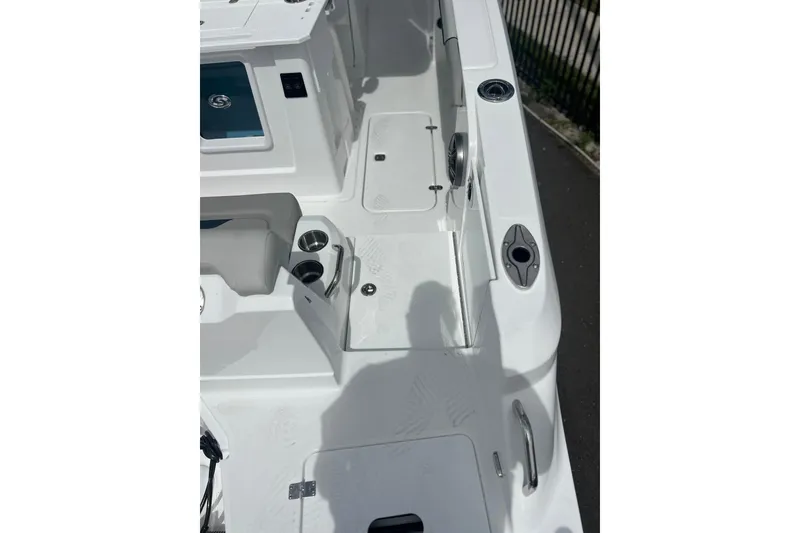 Slide: The Image of 2025 Hurricane Center Console 24 OB boat interior with seating and storage compartments. - 25