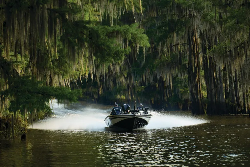 Slide: The Image of 2026 Nitro Z21 XL Pro boat with advanced Garmin equipment, parked outdoors. - 76