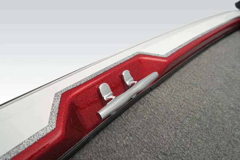 Slide: The Image of Open storage compartment in 2026 Nitro Z17 boat, featuring carpeted interior and wiring. - 23