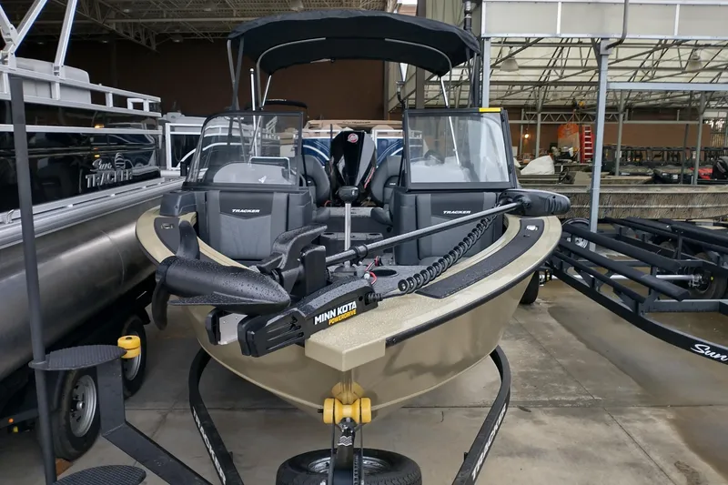 Slide: The Image of 2026 Tracker Targa V-19 Combo boat with Minn Kota motor in showroom. - 11