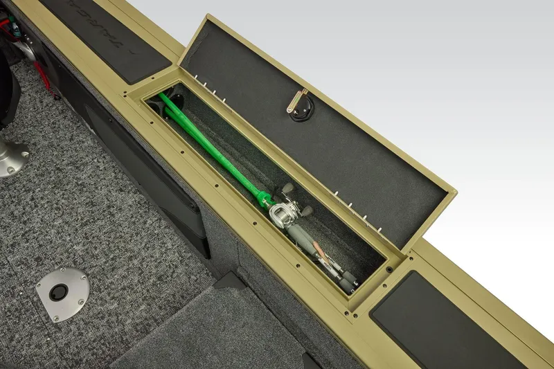 Slide: The Image of 2026 Tracker Targa V-19 Combo boat interior with storage compartment and speaker. - 36