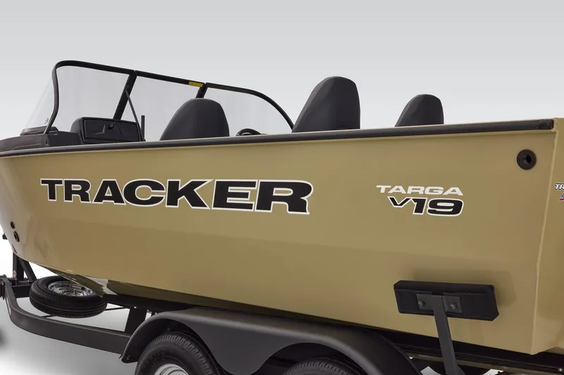Slide: The Image of 2026 Tracker Targa V-19 Combo boat on trailer, side view. - 62