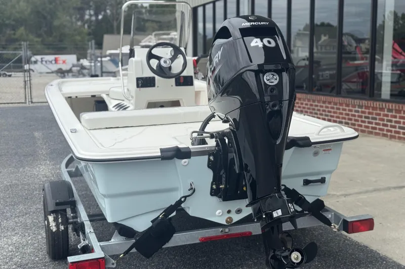 Slide: The Image of 2026 Mako Pro Skiff 13 CC with Mercury 40 engine on trailer. - 46