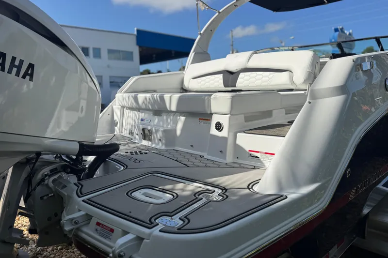 Slide: The Image of 2026 Four Winns HD8 OB boat with Yamaha outboard motor, featuring spacious seating and sleek design. - 17